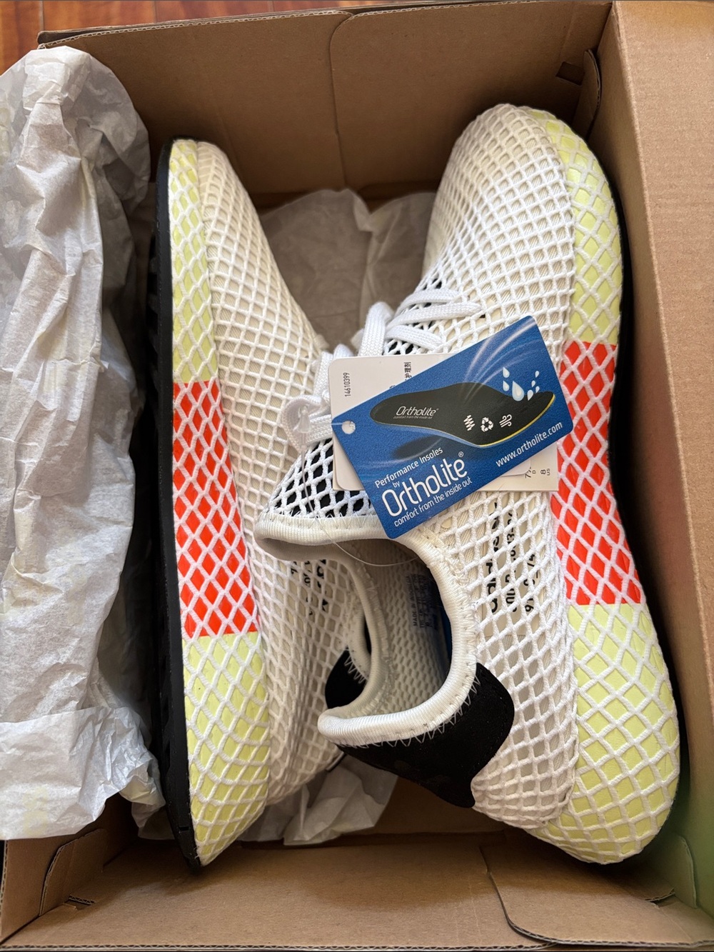 adidas White Mesh Sneakers with Neon Yellow and Orange Accents